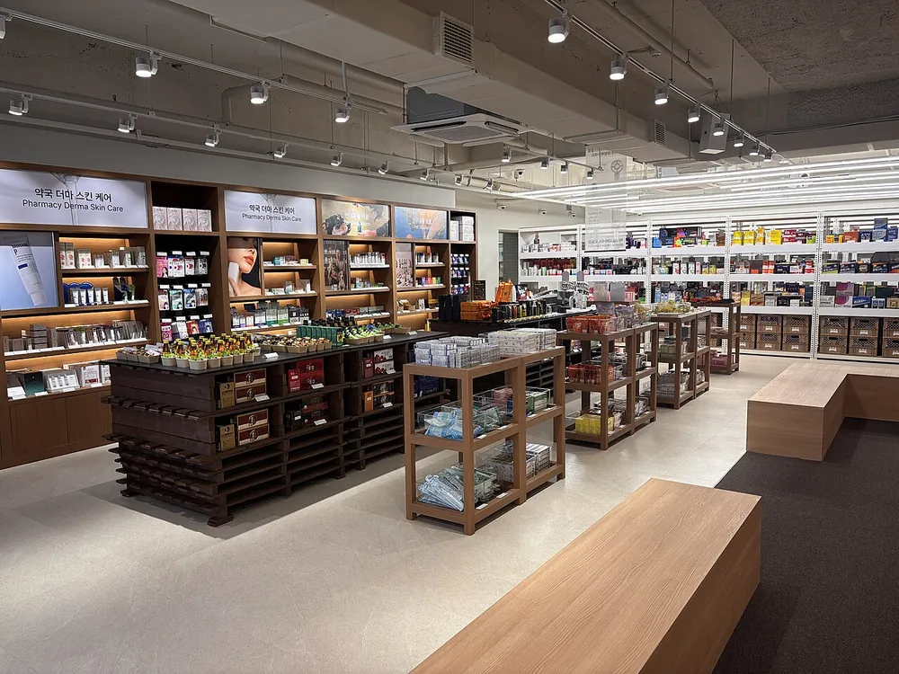 Shelves and an open counter area inside a Korean pharmacy.