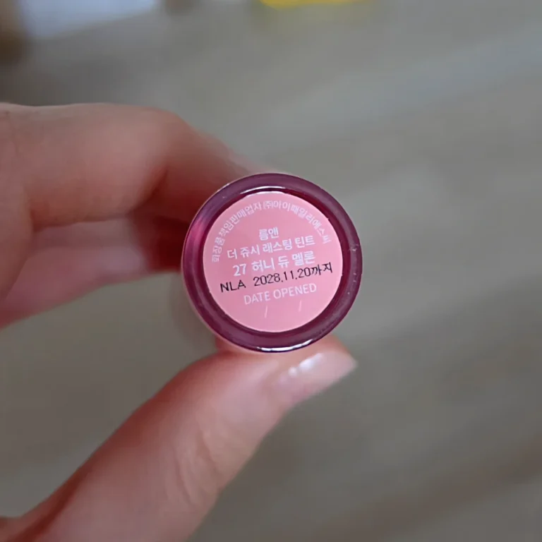 Base label showing rom&nd The Juicy Lasting Tint, 27 Honey Dew Melon, in Korean.