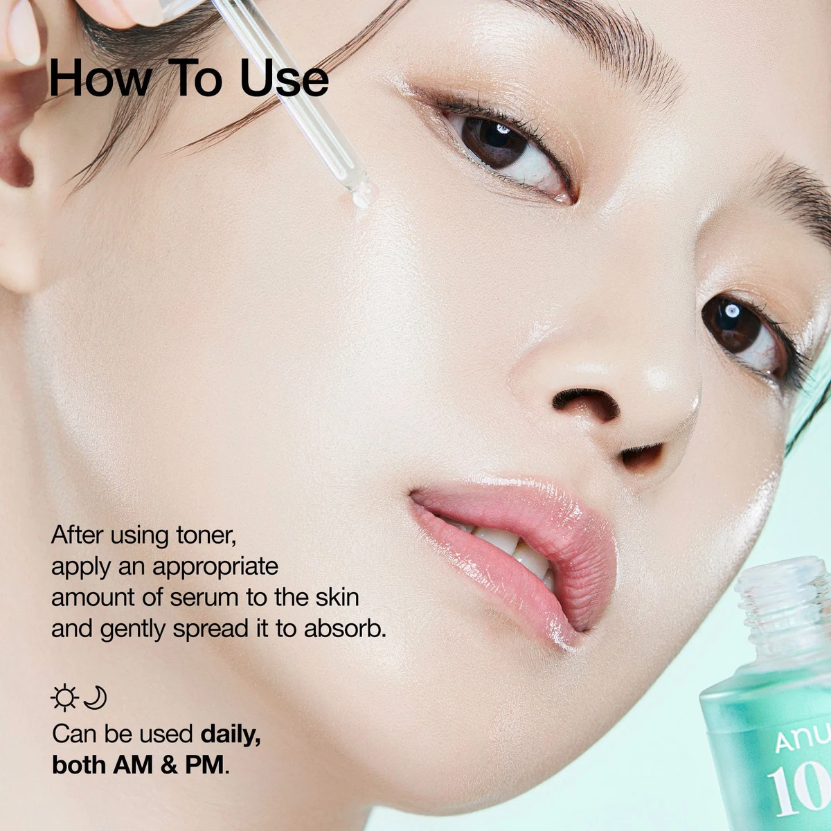 Anua brand demonstration showing serum application with a dropper beside the cheek