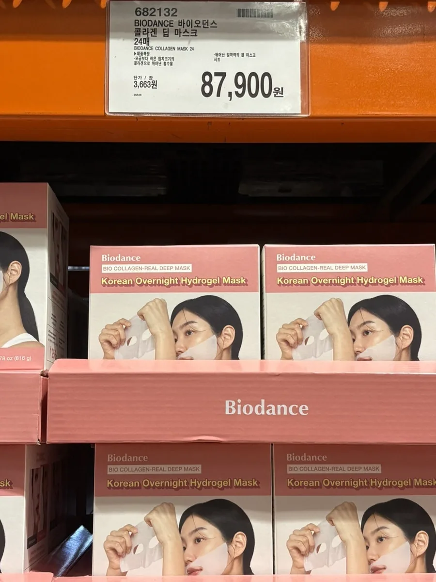 Biodance Bio Collagen Real Deep Mask 24-mask boxes on a Korean Costco shelf with a photographed 87,900 won price