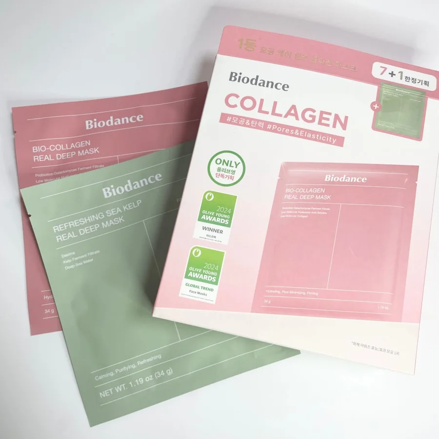 Korean Biodance collagen mask set with pink original pouches and a green Sea Kelp bonus pouch