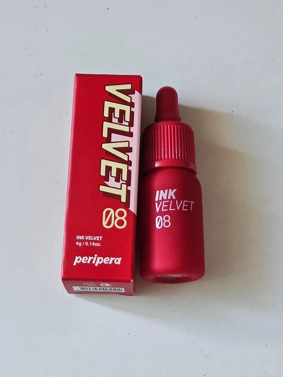 Peripera Ink Velvet 08 bottle and 4 g box photographed on a pale surface